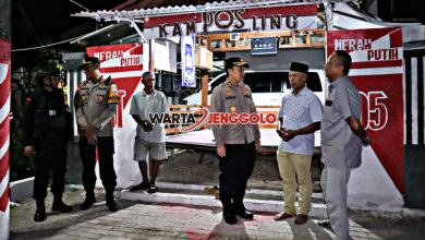 Kapolres Bojonegoro bersama warga dalam kegiatan Jogo Jatim untuk menghidupkan kembali siskamling demi menjaga keamanan lingkungan.